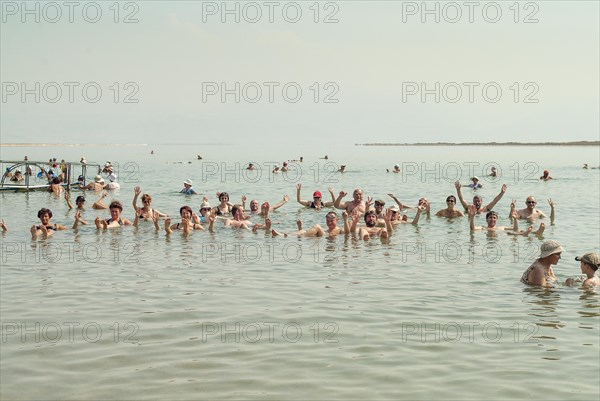 Tourists bathing in the Dead Sea