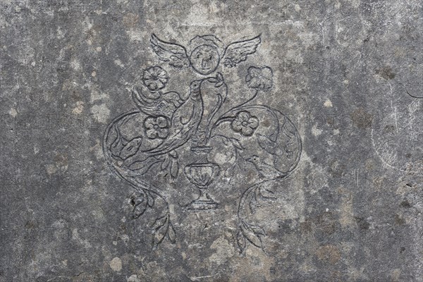 Relief carved in concrete