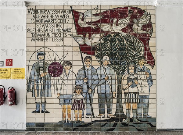 Mural of tiles with saying by Walter Ulbricht