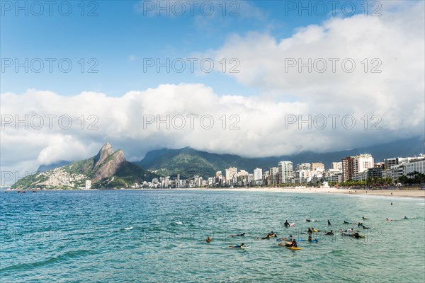 Surfers on Arpoador beach