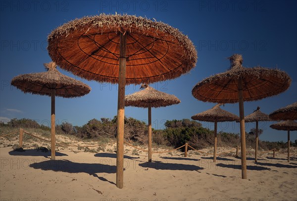 Straw umbrellas