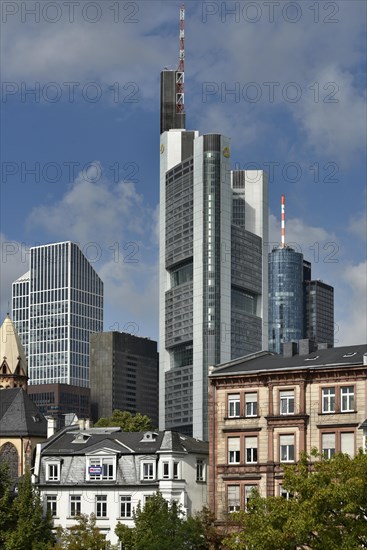 Old buildings in front of skyscrapers