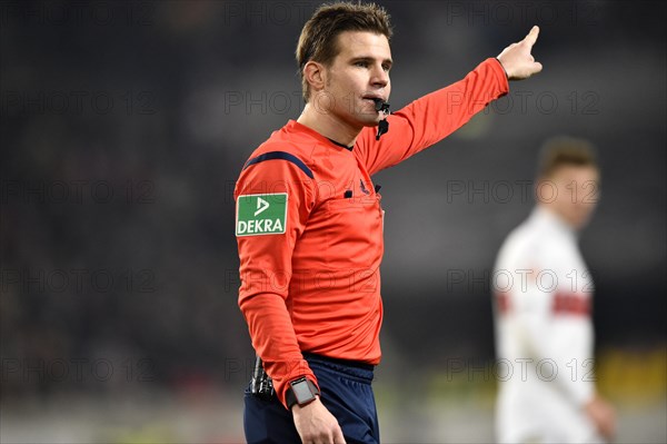 Referee Dr. Felix Brych gestures for kick