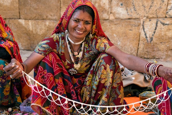 Saleswoman with colourful sari