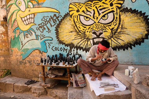 Street vendor with teak figures