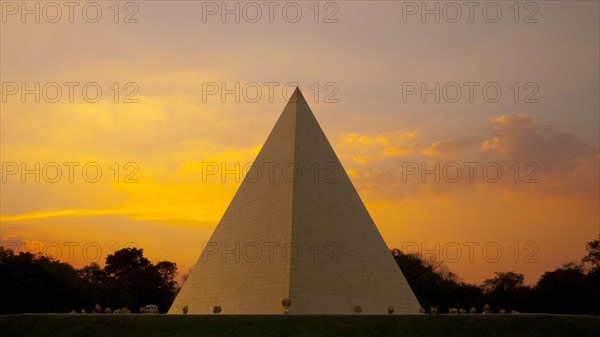 Now Chand Khonnokyoong Memorial Hall at the at Phra Dhammakaya temple at sunset