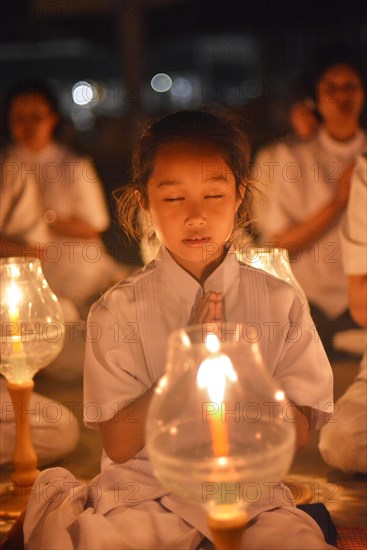 Young girl praying