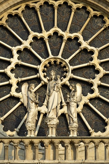 Figures in a rose window