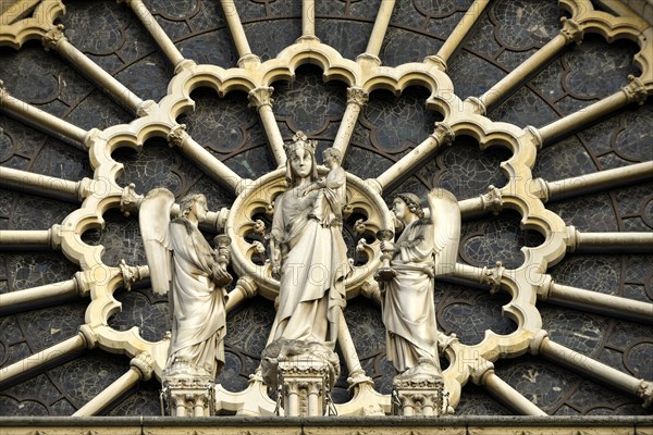 Figures in a rose window