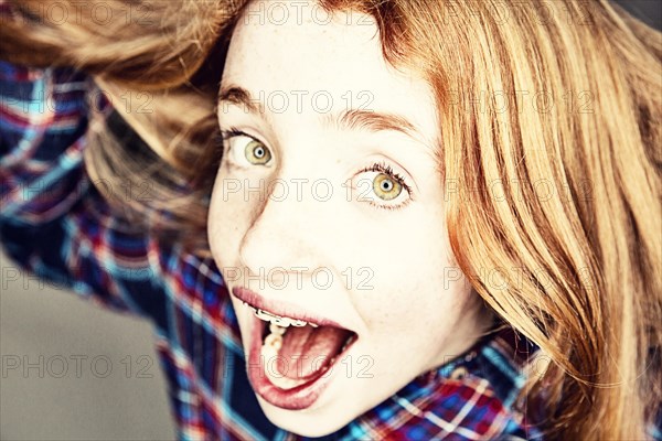 Naughty screaming red-haired girl