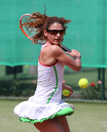 Young woman playing tennis