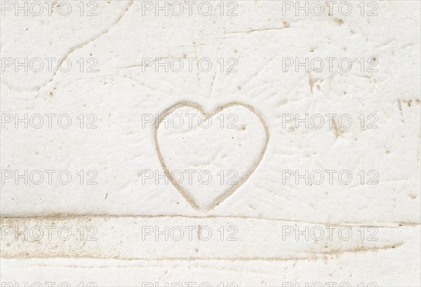 Heart incised in stone