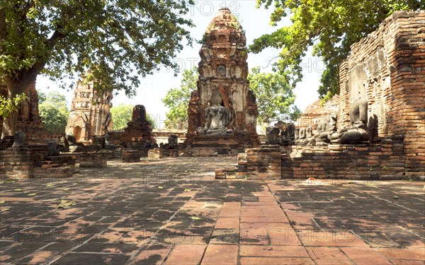 Dilapidated temple with Buddha statue