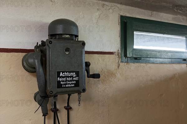 Telephone in a bunker from the 2nd World War with inscription