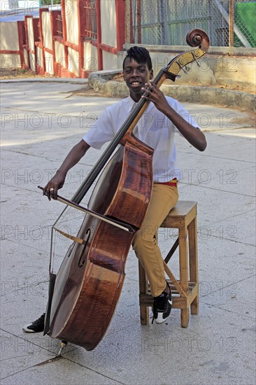 Music student playing the bass