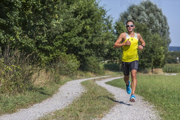 Runner on a gravel road