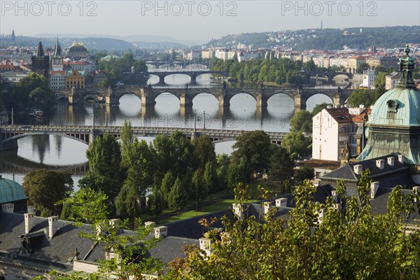 View from Letna Hill over the Vltava River bridges to the historic centre with bridge tower