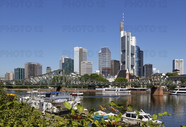 Eiserner Steg or Iron Bridge across Main river and financial district