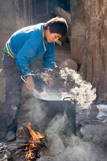 Boy preparing breakfast