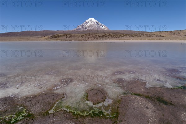 Sajama Volcano and frozen lake on Rio Sajama