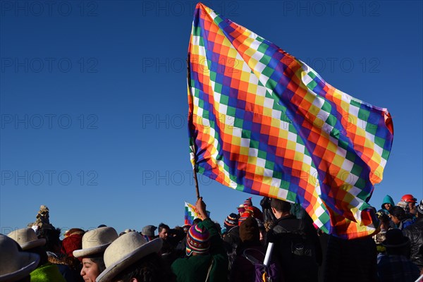 Indios with the Wiphala flag