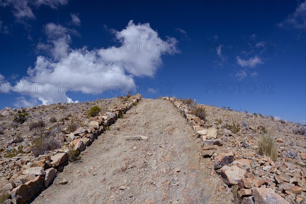 Footpath through barren stony land