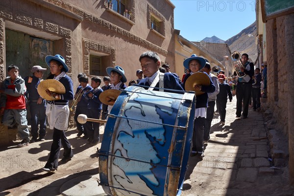 Children in a chapel in a festive procession during a Fiesta