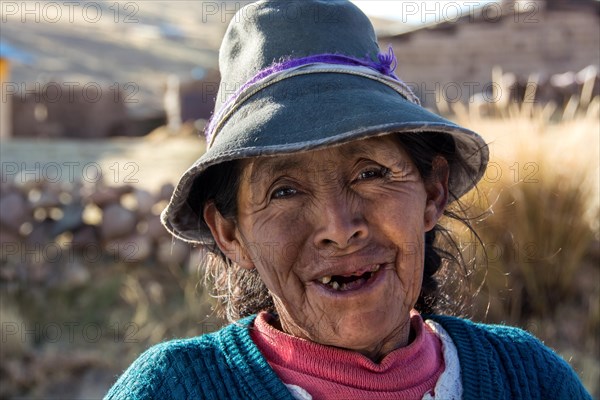 Indigenous woman with hat