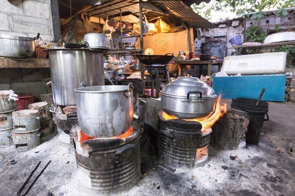 Pots over an open fire