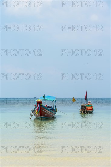 Longtail boats on the sea