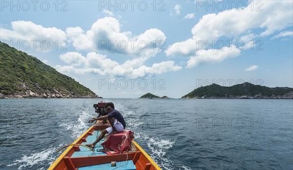 Local man sitting at the stern