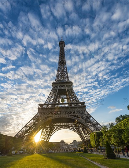 Sunset behind Eiffel Tower