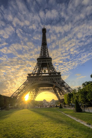 Sunset behind Eiffel Tower