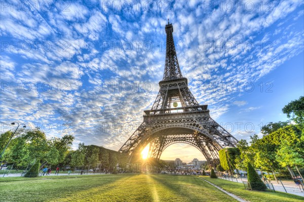 Sunset behind Eiffel Tower