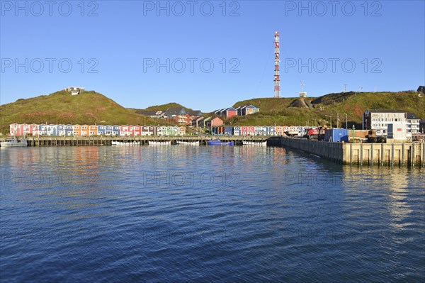 Inland port with lobster shacks and transmission tower