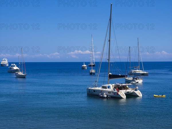 Bay with yachts off the coastal town of Panarea