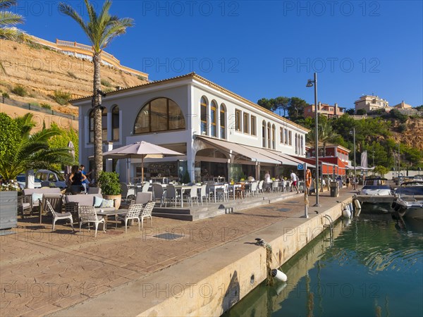 Restaurants on the promenade along the marina