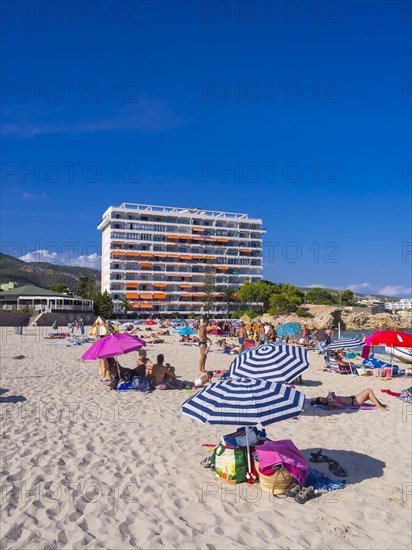 Bathers on the lively beach of Magaluf