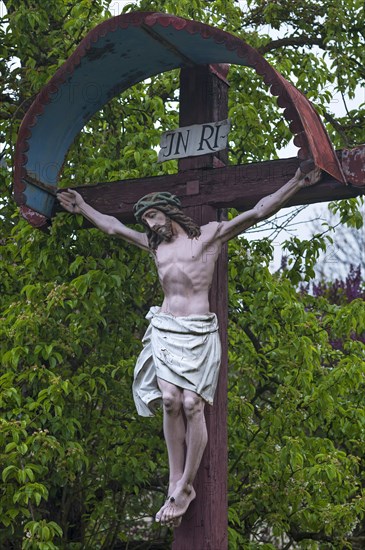 Christ figure on a cross