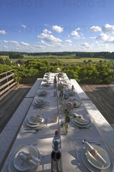 Nicely laid table in front of the Franconian Switzerland countryside