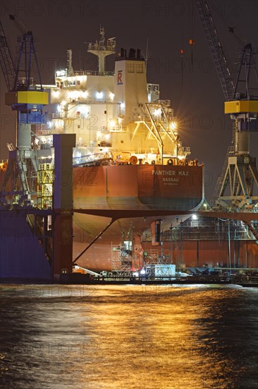 Cargo ship in the floating dock of Blohm and Voss