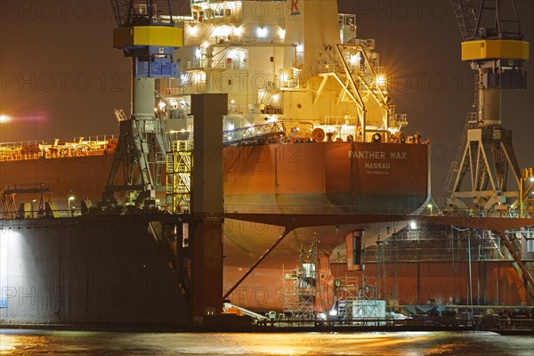 Cargo ship in the floating dock of Blohm and Voss