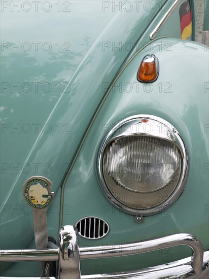 Fender with headlight of a VW Beetle vintage fifties