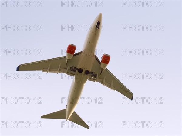 Low angle view of a twin-engine jet aircraft
