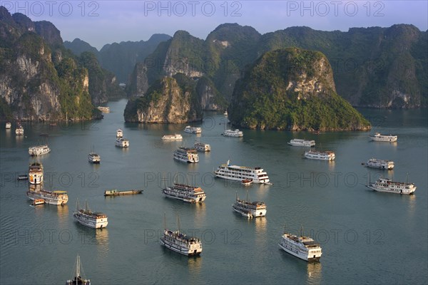 Junks and boats moored in Halong Bay or Vinh Ha Long