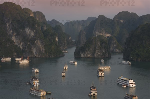 Junks and boats moored in Halong Bay or Vinh Ha Long