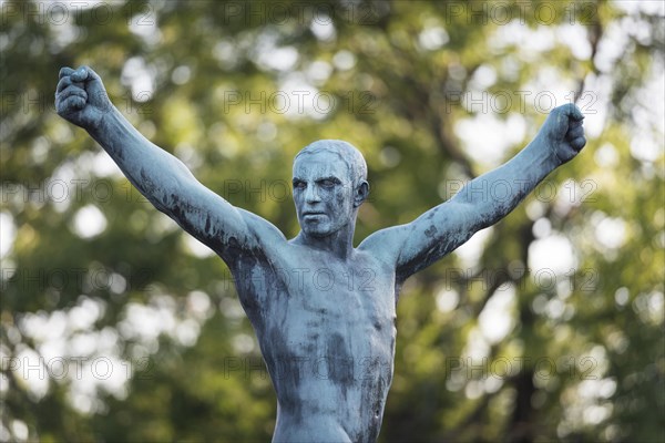 Man stretching his arms upwards