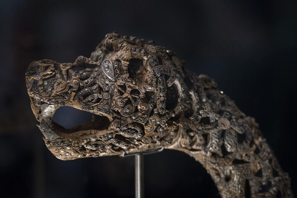 Wooden carved animal head post