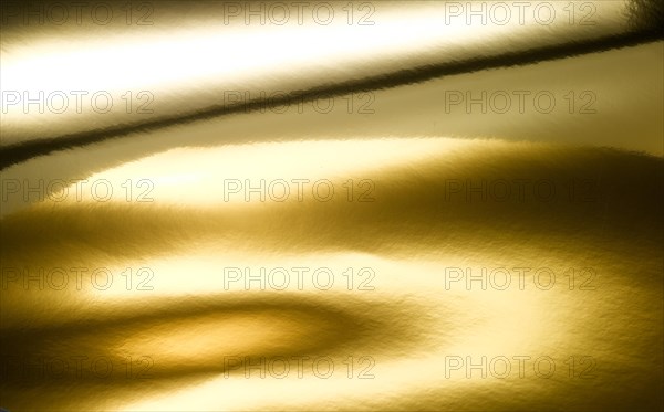Gold foil with reflections