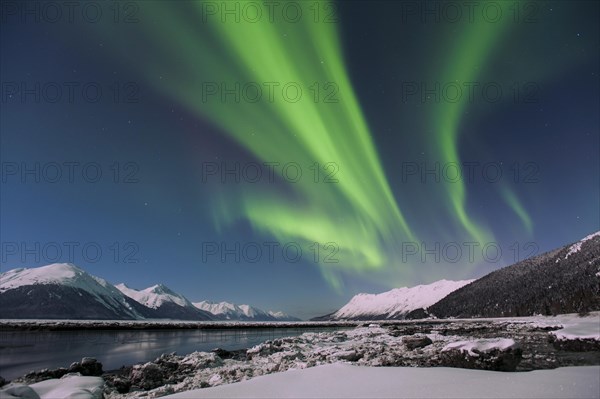 Aurora borealis and moonlight at Turnagain Arm